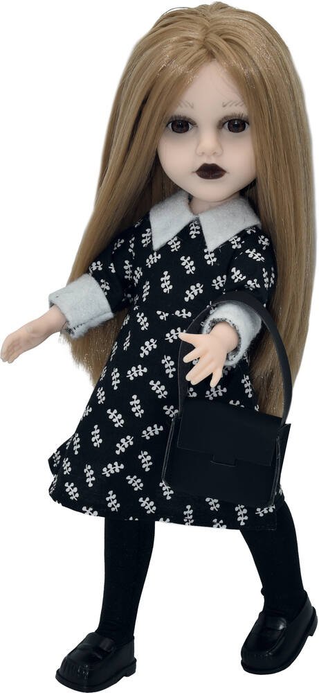 Une Poupée Barbie Noire Et Blanche Porte Une Robe Noire Et Blanche