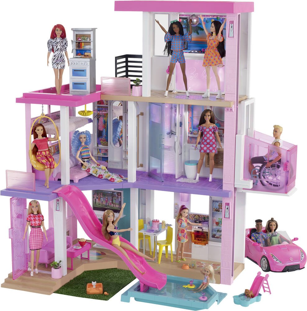 Barbie Maison de Rêve est une véritable féérie interactive faite de  lumières, de sons et de mouvements, sans oublier une piscine et un garage !  