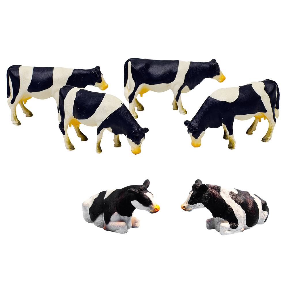 Vaches noires et blanches, figurines